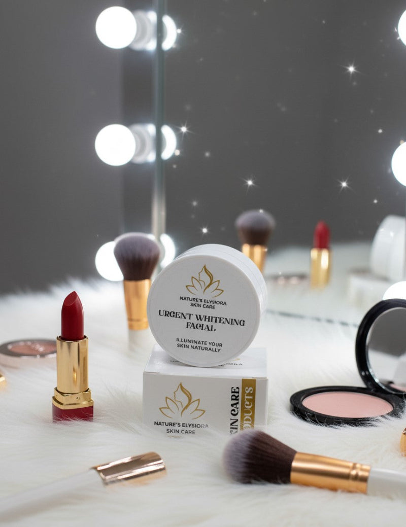 Makeup products including a lipstick, facial cream, and brushes on a reflective surface with blurred lights in the background.
