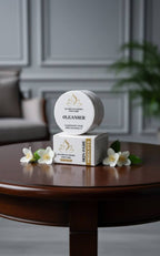 Cosmetic products on a wooden table with flowers and a neutral background